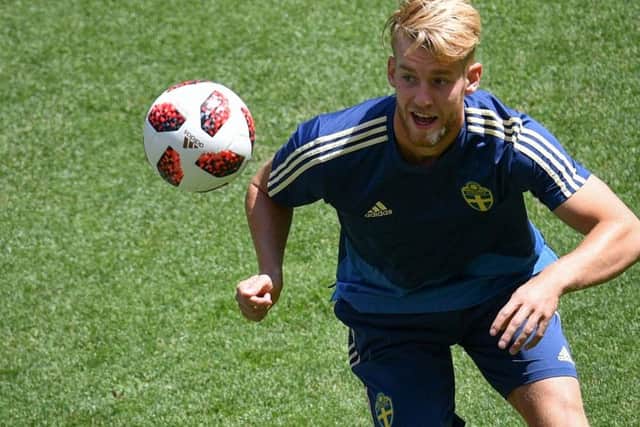 Filip Helander gets stuck in during a Sweden training sessions. The defender has ten international caps