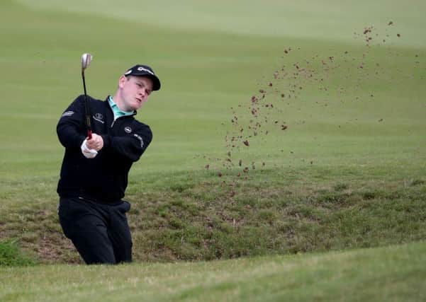 Scotland's Robert MacIntyre in the bunker on the 12th hole at the Scottish Open. Picture: Jane Barlow/PA Wire