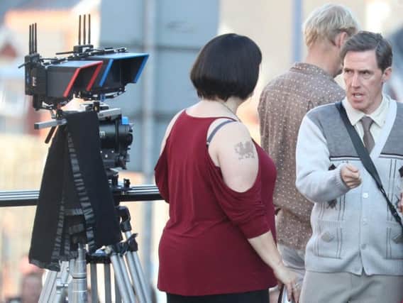 Rob Brydon and Ruth Jones filming. Picture: PA