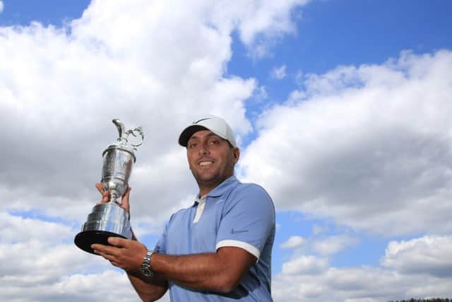 Defending Open champion Francesco Molinari of Italy with the Claret Jug. Picture: Andrew Redington/Getty Images