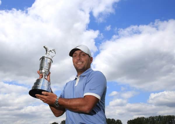 Defending Open champion Francesco Molinari of Italy with the Claret Jug. Picture: Andrew Redington/Getty Images