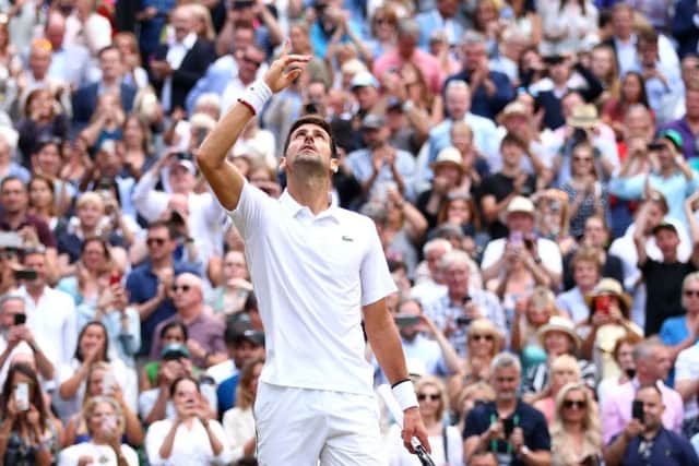 Novak Djokovic celebrates winning the men's singles final against Roger Federer at Wimbledon. Picture: Clive Brunskill/Getty Images