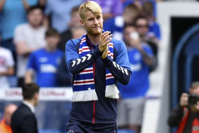 Rangers new signing Filip Helander is unveiled to the crowd at half-time. Picture: SNS
