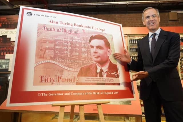 Mark Carney with the note.Picture: Getty