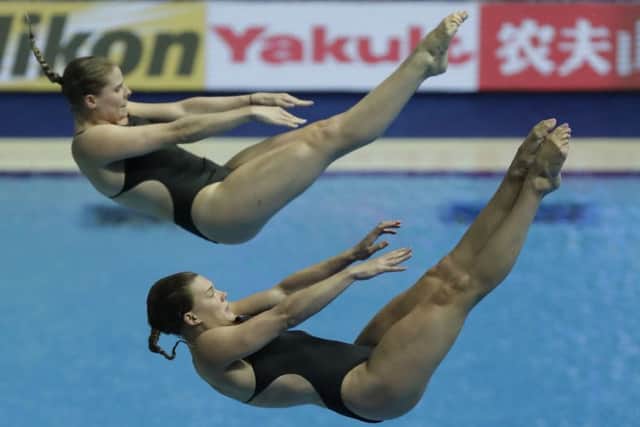 Grace Reid and Katherine Torrance of Great Britain in the women's 3m synchro springboard final in Gwangju. Picture: Lee Jin-man/AP