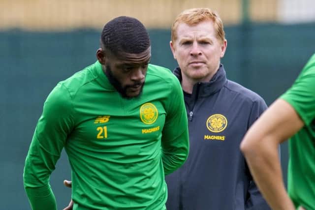 Olivier Ntcham trains under the watchful eye of manager Neil Lennon. Picture: Craig Williamson/SNS