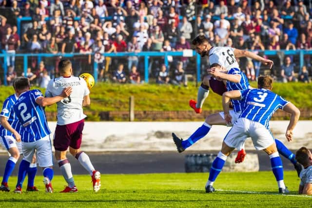 Centre back
Craig Halkett powers home a header to make it 1-0 for Hearts. Picture: Roddy Scott/SNS