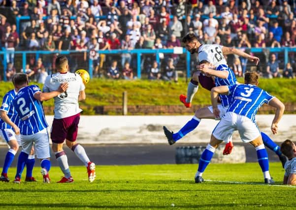 Centre back 
Craig Halkett powers home a header to make it 1-0 for Hearts. Picture: Roddy Scott/SNS