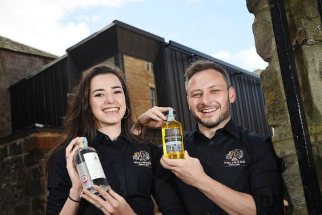 Holyrood Distillery visitor centre staff Rebecca Orr and oin  Murch prepare for the launch. Picture: Greg Macvean