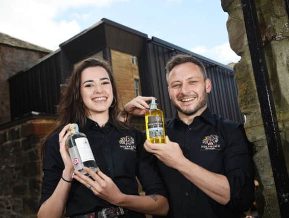 Holyrood Distillery visitor centre staff Rebecca Orr and oin  Murch prepare for the launch. Picture: Greg Macvean