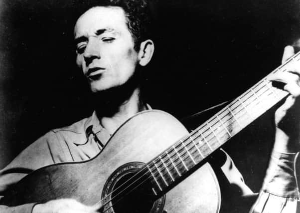 Woody Guthrie sang about the racism of the current US Presidents father Fred (Picture: AP)