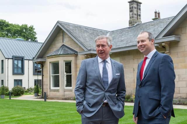 Kingsmills chief Tony Story (left) with Gordon McKean of Barclays. Picture: John Paul