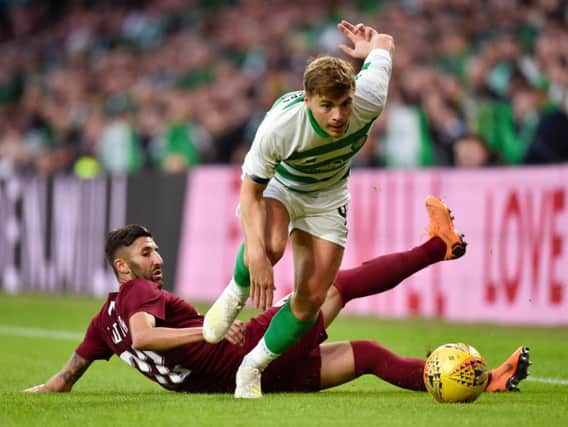 Celtic's James Forrest evades Sarajevo goalscorer Benjamin Tatar's challenge