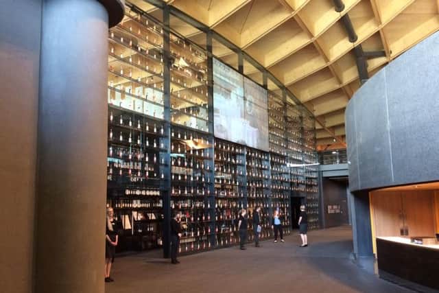 The incredible wall of Macallan bottles that greets you upon entering. The ceiling is one of the most complex timber roofs in the world with 380,000 individual components and 2,500 roof panels