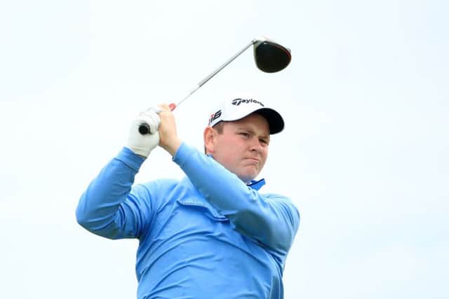 Robert MacIntyre tees off at the 11th. Picture: Andrew Redington/Getty Images