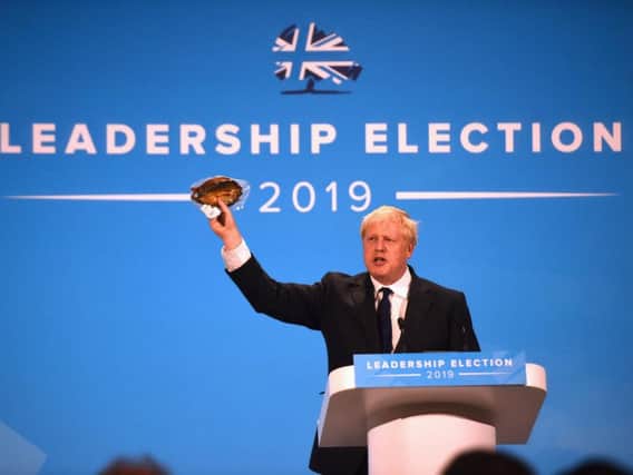 Boris Johnson with a kipper. Picture: PA