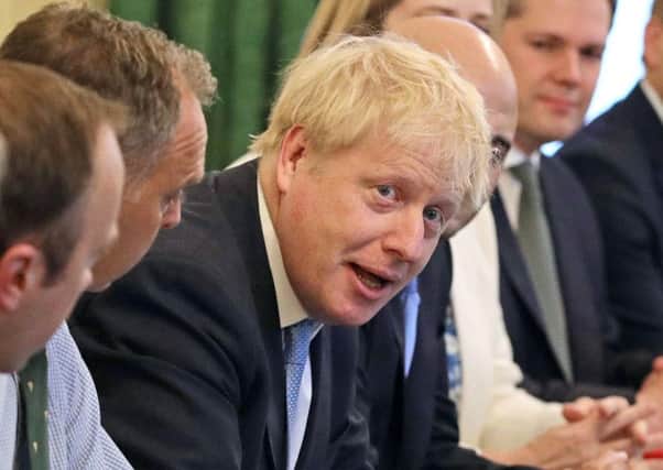 Boris Johnson wrote that Winston Churchill was a glory-chasing goal-mouth-hanging opportunist (Picture: Getty)