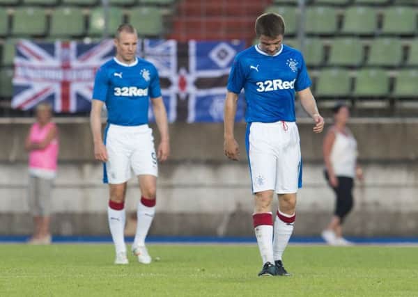 Jordan Rossiter, right, and Kenny Miller cut dejected figures during Rangers' defeat by Progres in 2017. Picture: SNS