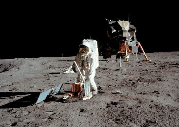 Apollo 11 space mission US astronaut Buzz Aldrin is seen conducting experiments on the moon's surface in a picture taken by Neil Armstrong (Picture: Neil Armstrong/Nasa via AFP/Getty)