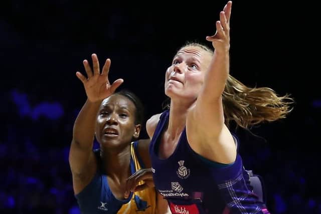 Scotland's Claire Maxwell, right, with Barbados' Tonisha Rock-Yaw. Picture: Nigel French/PA Wire