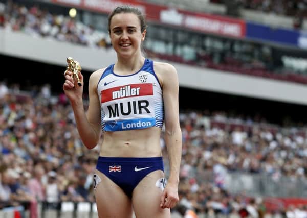 Britain's Laura Muir celebrates winning the Women's 1500m event