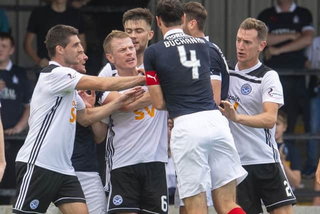 Tempers flare at Somerset Park as Falkirk are awarded a penalty. Picture: SNS