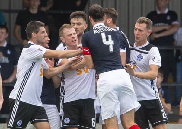 Tempers flare at Somerset Park as Falkirk are awarded a penalty. Picture: SNS
