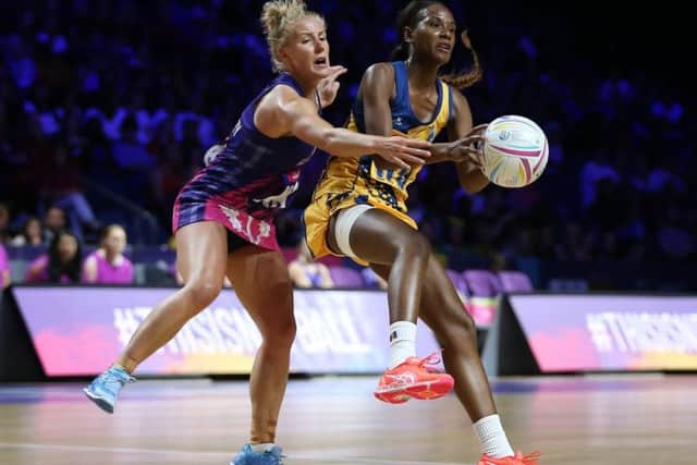 Barbados' Tonisha Rock-Yaw (left) and Scotland's Nicola McCleery battle for the ball during the Netball World Cup match. Picture: Nigel French/PA Wire.