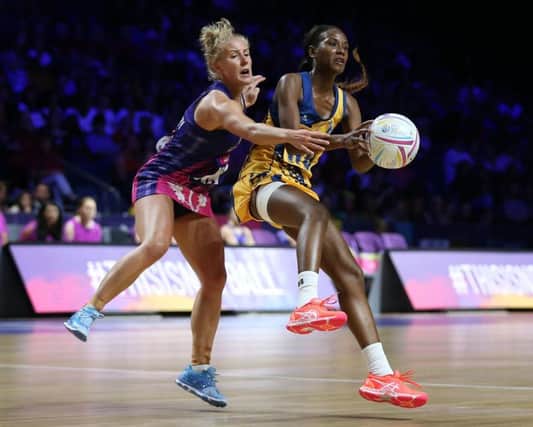 Barbados' Tonisha Rock-Yaw (left) and Scotland's Nicola McCleery battle for the ball during the Netball World Cup match. Picture: Nigel French/PA Wire.