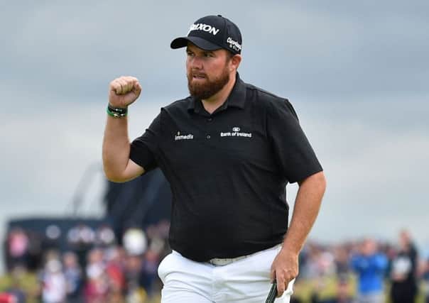 Open leader Shane Lowry celebrates a putt on the 15th hole. Picture: Glyn Kirk/AFP/Getty Images