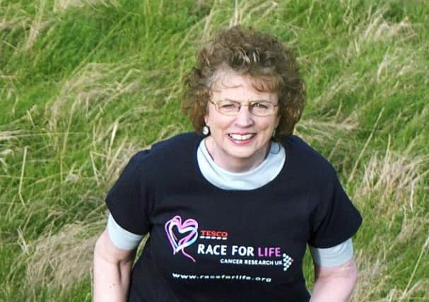 Trish Godman, seen here promoting Cancer Research's Race for Life, became an MSP in 1999