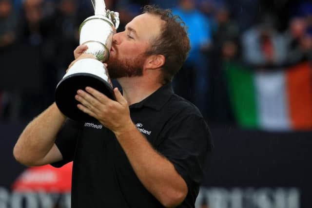 Shane Lowry kisses the Claret Jug at Royal Portrush