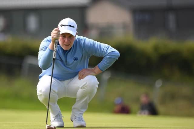 Bob MacIntyre lines up a putt at Royal Portrush