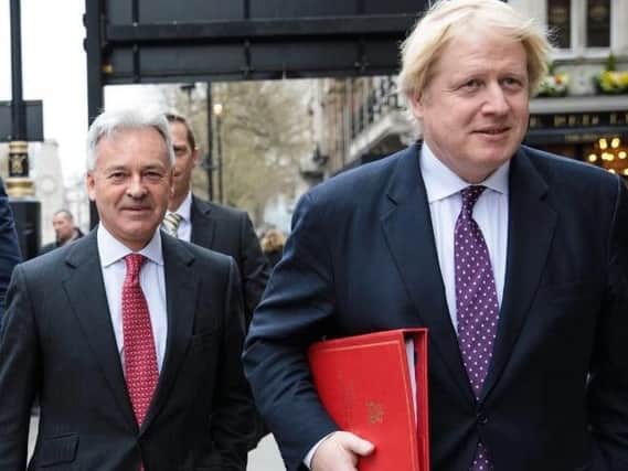 Foreign Office minister Sir Alan Duncan (left), pictured while serving at the department under Boris Johnson
