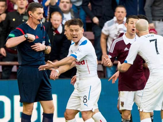 Ian Black remonstrates with the official during a 2-0 Rangers loss at Tynecastle.