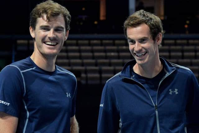 Andy Murray (right) with brother Jamie. The pair will compete in the Citi Open Mens Doubles
