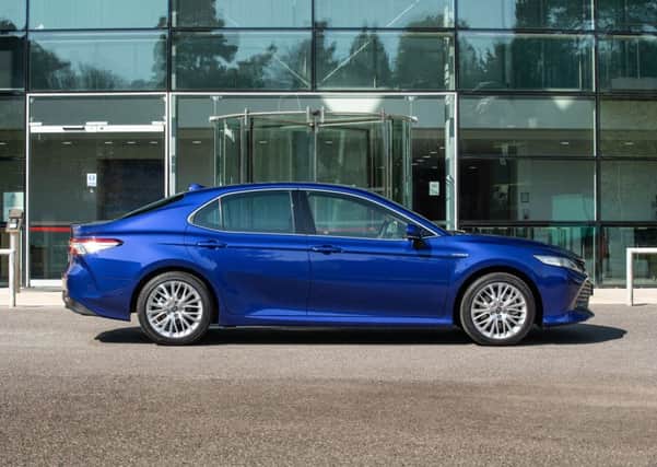 The 2019 Toyota Camry is elegant and and long - 16 feet from bumper to bumper