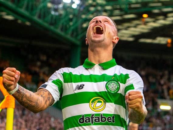 Leigh Griffiths celebrates scoring the third goal on his return to the Celtic starting line-up