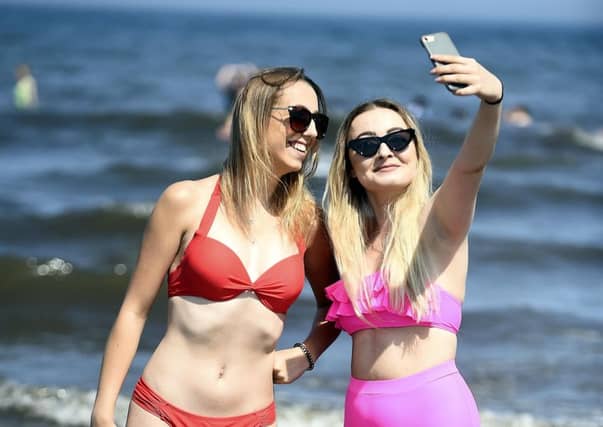 Magda Grzesczak
and Kinga Wojcik were at Portobello Beach to enjoy the hottest day in Edinburgh since records began. Picture: Lisa Ferguson