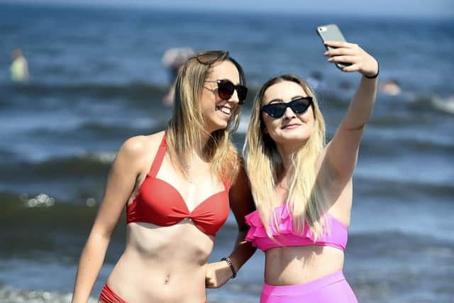 Magda Grzesczak
 and Kinga Wojcik were at Portobello Beach to enjoy the hottest day in Edinburgh since records began. Picture: Lisa Ferguson