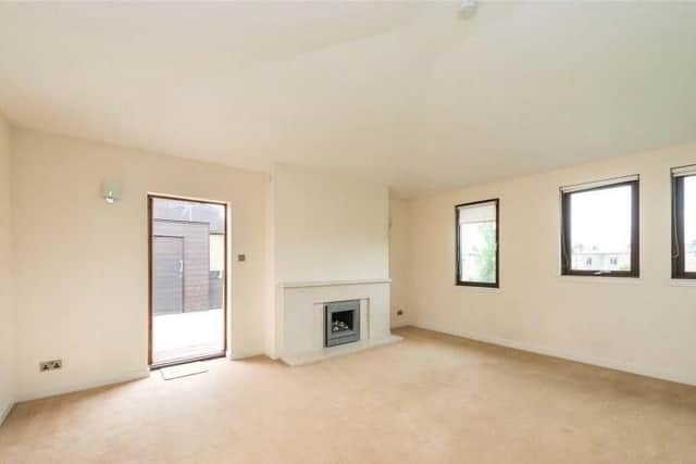 One of the two reception rooms, which could be a family dining room or further living room.