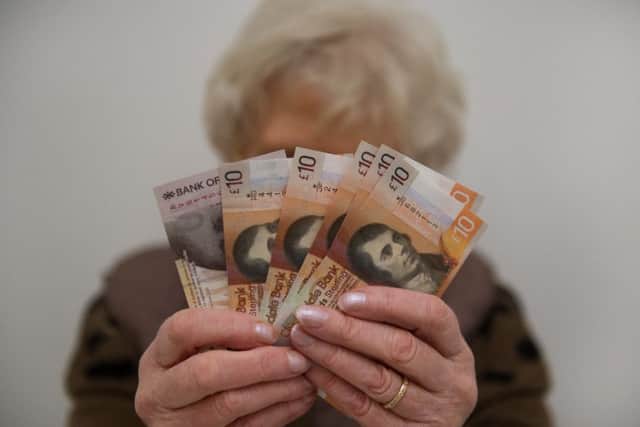 Holidays abroad may be more expensive but Scotlands exporters will benefit from pounds slide (Picture: John Devlin)