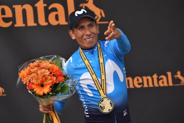 Colombia's Nairo Quintana celebrates on the podium in Valloire. Picture: Marco Bertorello / AFP/Getty