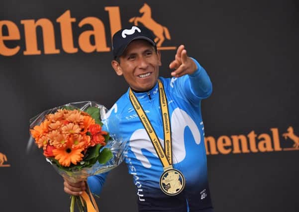 Colombia's Nairo Quintana celebrates on the podium in Valloire. Picture: Marco Bertorello / AFP/Getty