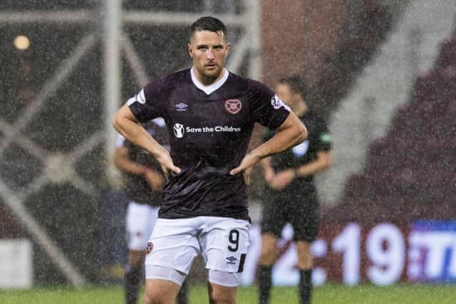 Hearts striker Conor Washington could face two weeks on the sidelines. Picture: SNS