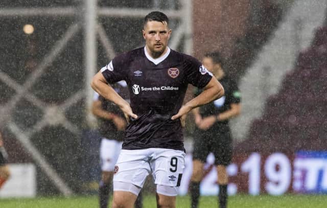 Hearts striker Conor Washington could face two weeks on the sidelines. Picture: SNS