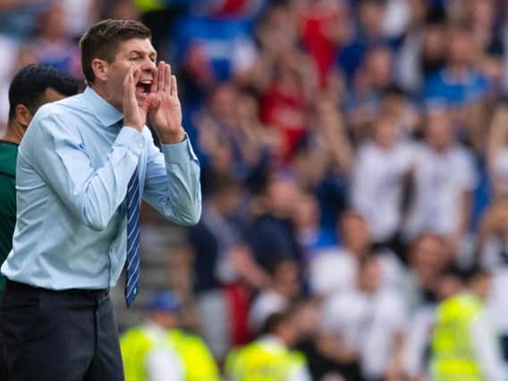 Steven Gerrard bellows instructions to his Rangers players from the sidelines.