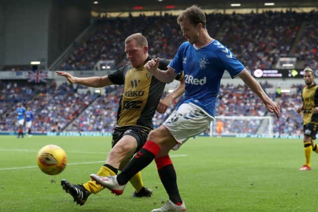 Andy Halliday challenges Progres Niederkorn's Adrian Ferino at Ibrox. Picture: Andrew Milligan/PA Wire