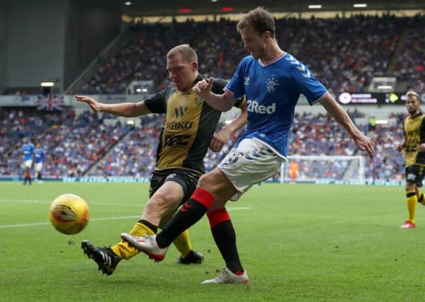 Andy Halliday challenges Progres Niederkorn's Adrian Ferino at Ibrox. Picture: Andrew Milligan/PA Wire