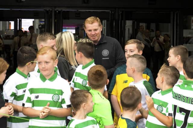Neil Lennon with young fans at the Celtic Festival at the SEC. Picture: SNS